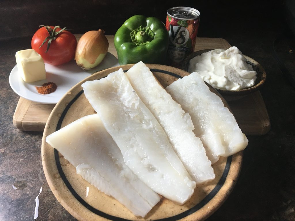 Baked fish a' la Maurice ingredients - fish, butter, onion, tomato, green pepper, tomato juice, sour cream.