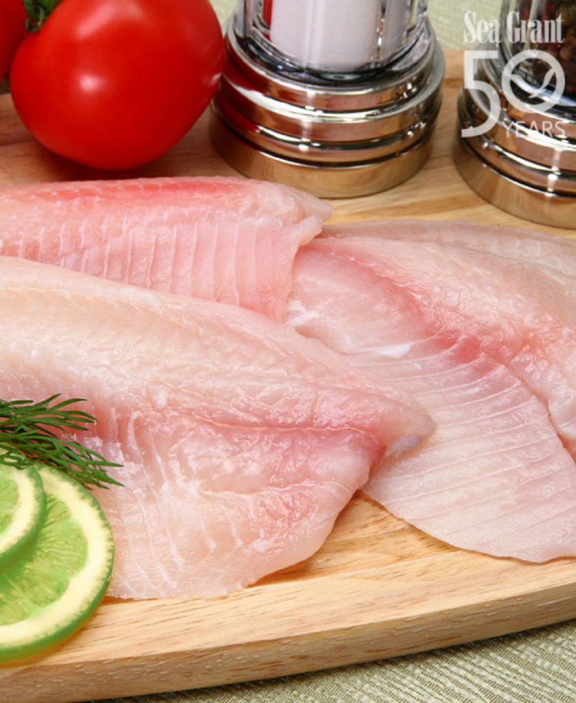 Fish fillets with slices of lime.