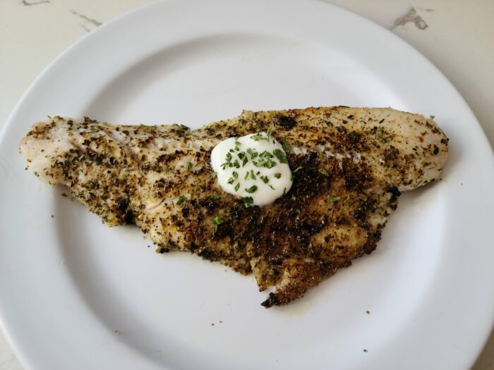 Sauteed whitefish with seasonings and Greek yogurt