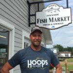 Craig Hoopman stands outside of Hoop's Dockside Fish Market.