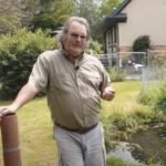 Steve DeBaker stands by one of the trout ponds.