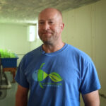 Nate Calkins in a blue shirt.